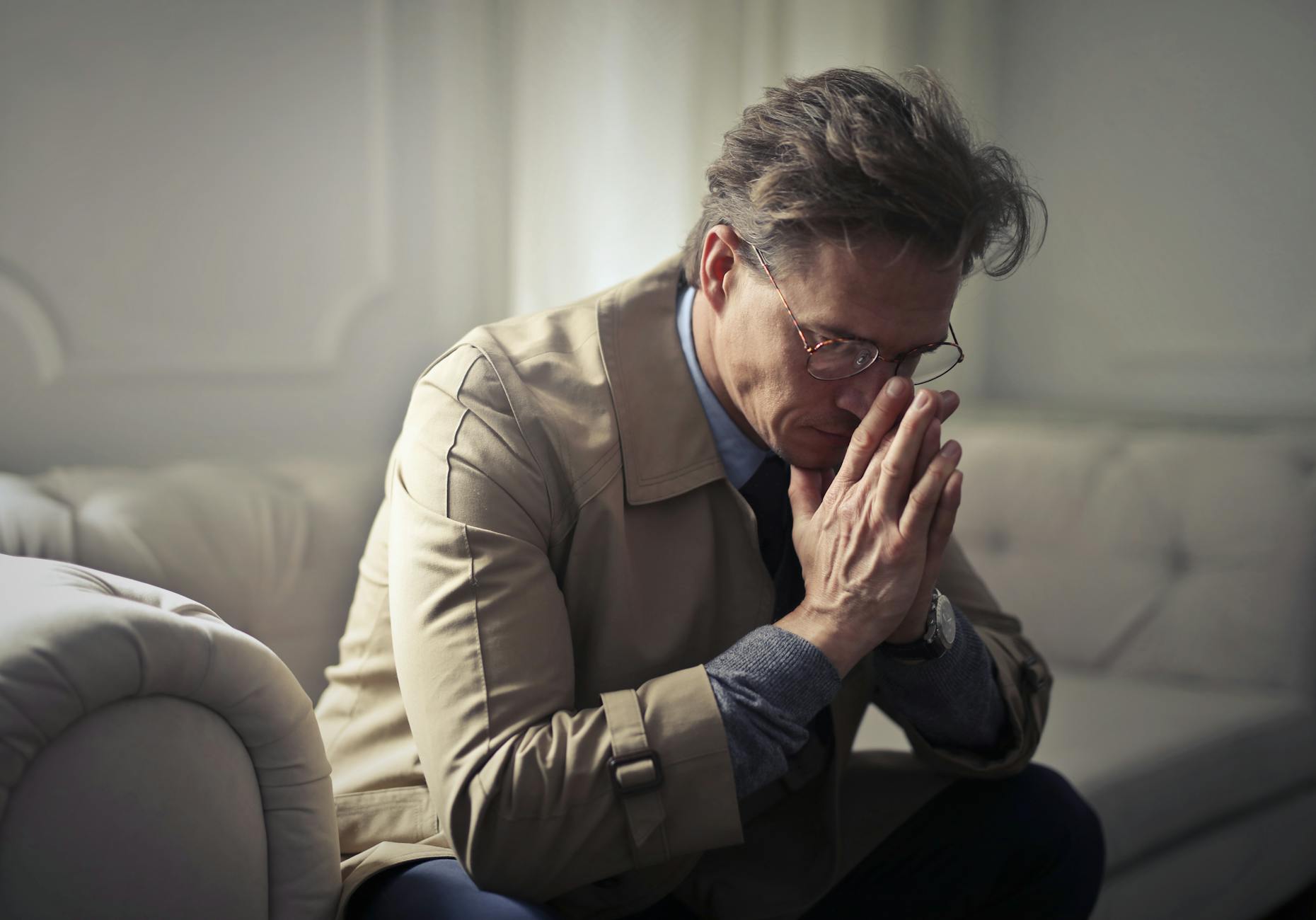 A person struggling with anxiety symptoms and mental health challenges