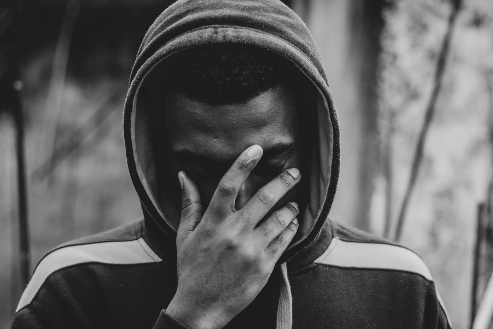 Person sitting alone at night reflecting on their anxiety journey and inner struggles